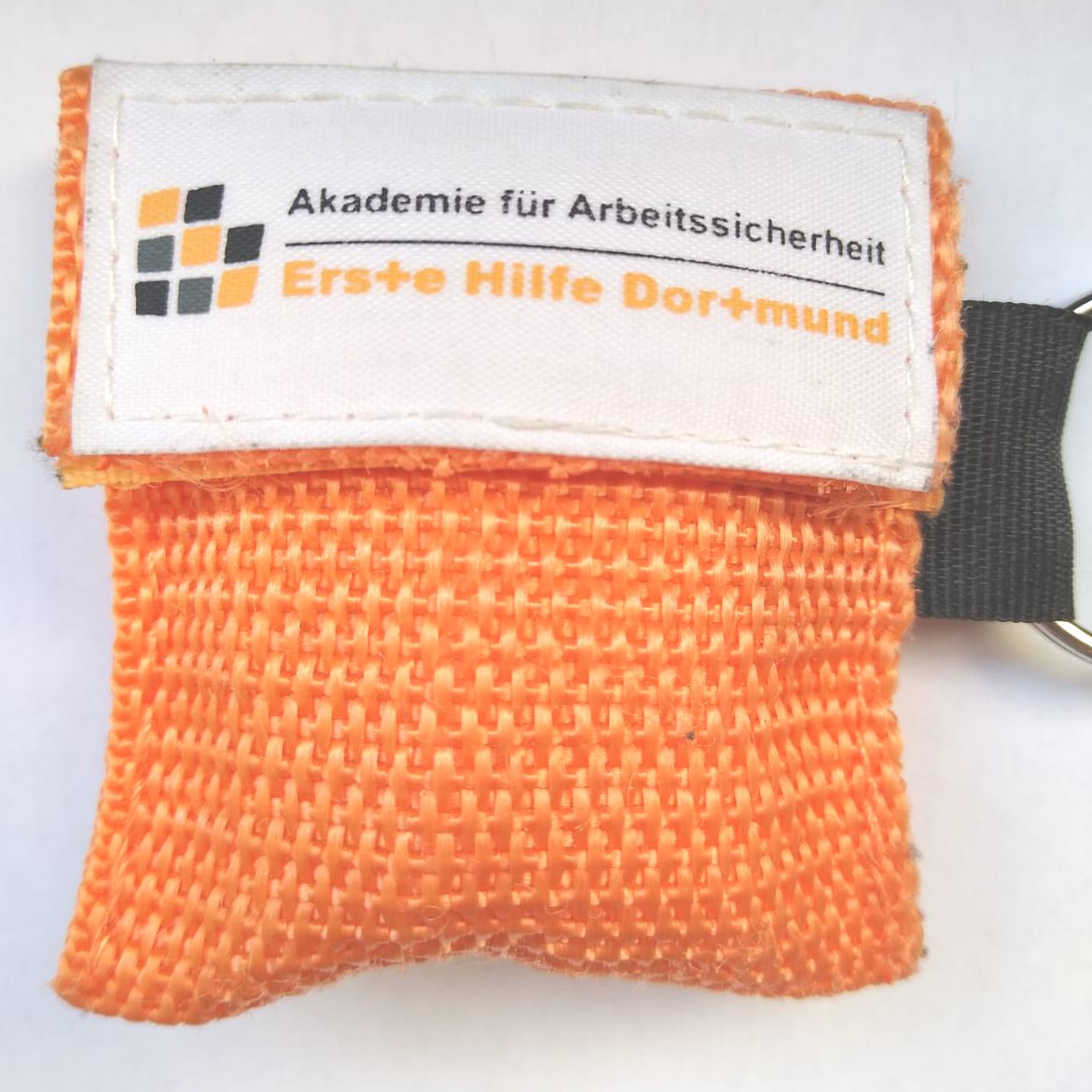 Schlüsselanhänger mit Beatmungsmaske - Akademie für Arbeitssicherheit -  Erste Hilfe Dortmund